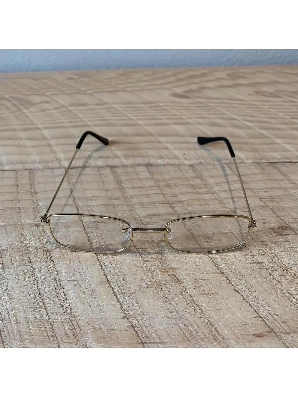 Y2k 90s 2000s vintage unique slim style lense sunglasses. gold trim with clear